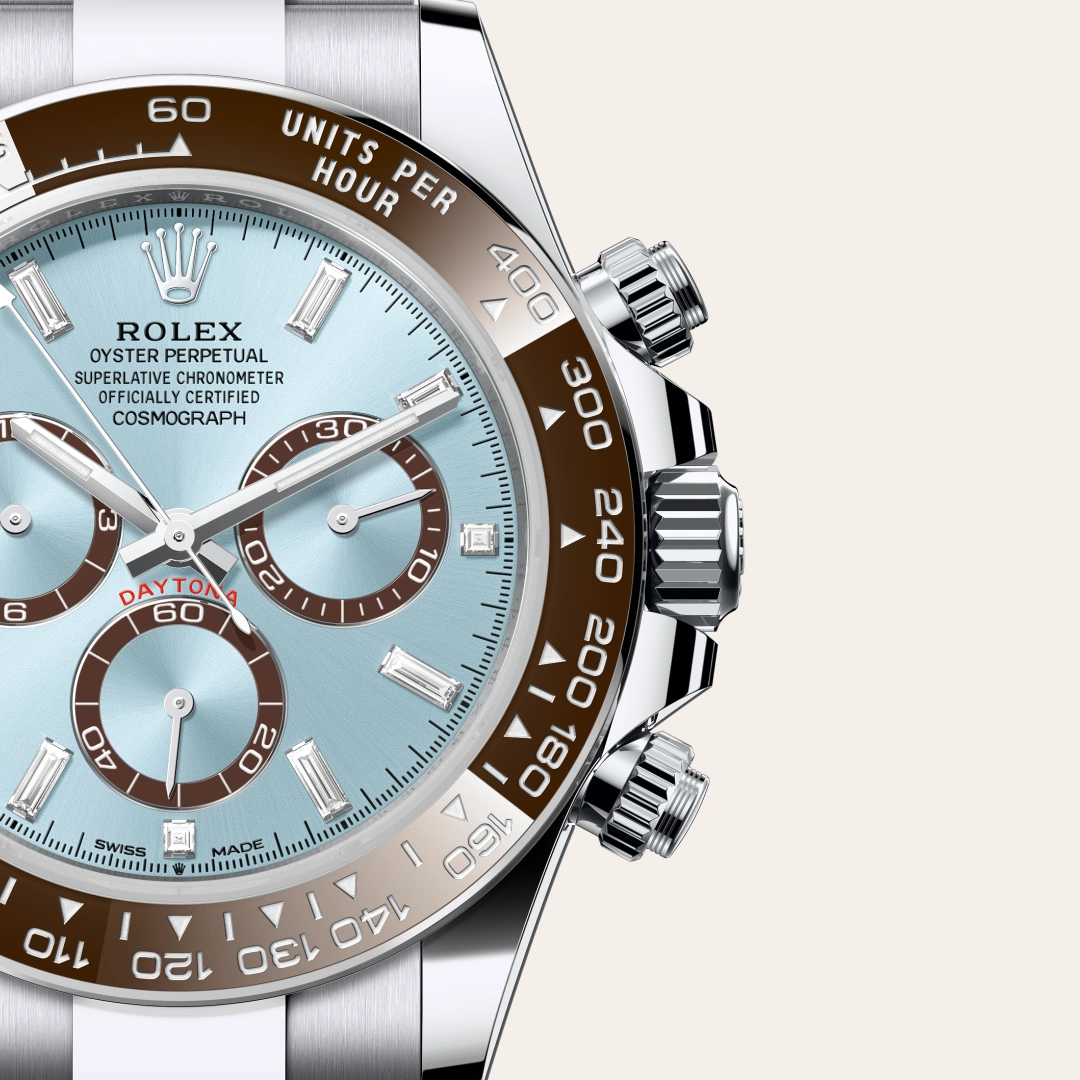 Rolex Cosmograph Daytona in Platinum with a Ice blue, chestnut brown counter rings set with diamonds dial, Chestnut brown monobloc Cerachrom bezel in ceramic with moulded numerals and graduations bezel, Oyster, three-piece solid links bracelet.