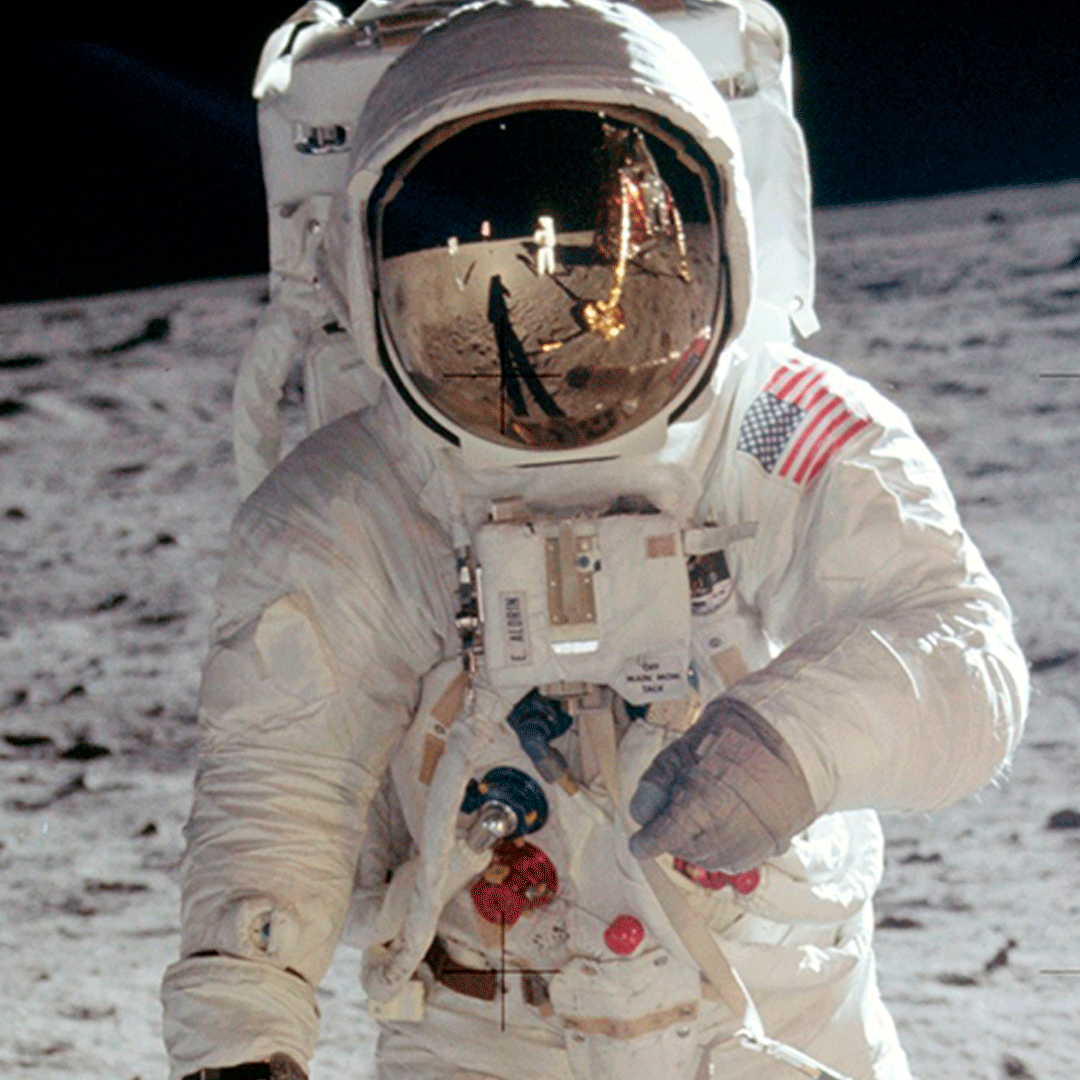 an american astronaut wearing a space suit on the moon