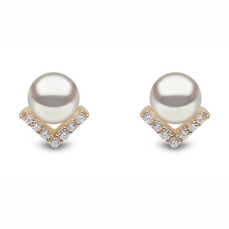 Single pearl earrings with seven diamonds each