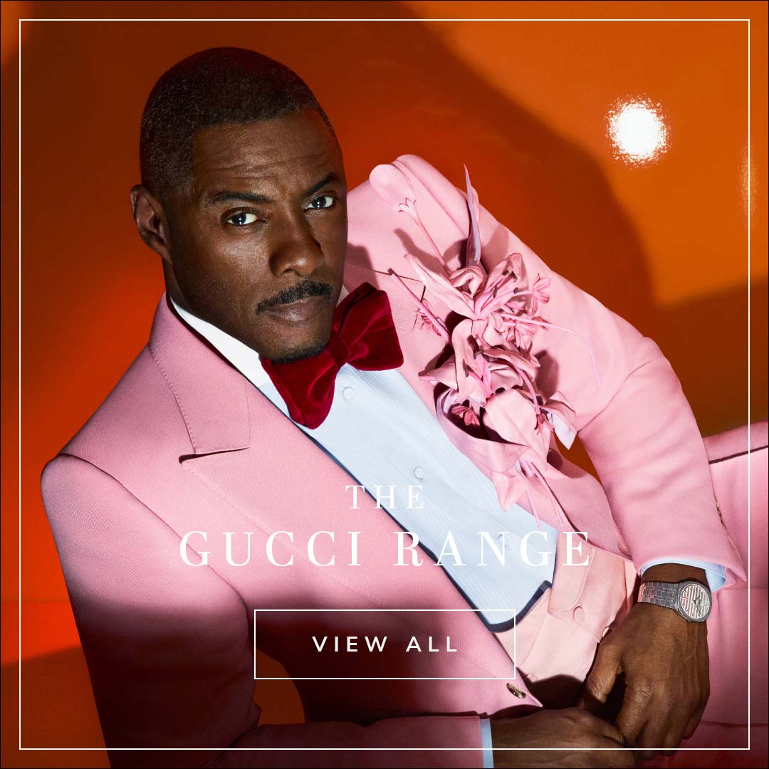 Idris Elba Pink Suit, Gucci Watch with text Gucci view all